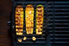Spicy Hot Grilled Zucchini, Cooked On An Electric Grill. Banner. The Concept Of Healthy Eating And Delicious Food. Royalty Free Stock Image