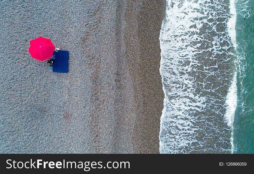 Beach Umbrella On The Shore Of The Black Sea Next To Kobuleti.