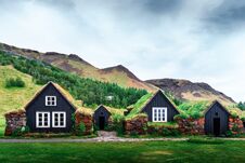 Traditional Houses With Grass On Roof Royalty Free Stock Photos