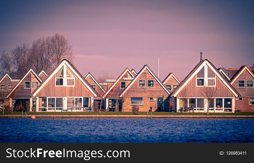 Holiday village resort on the waterfront of lake Sneekermeer in Terherne, Friesland vintage colors. Holiday village resort on the waterfront of lake Sneekermeer in Terherne, Friesland vintage colors