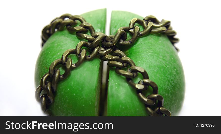 Apple cut and locked in chains. Apple cut and locked in chains.