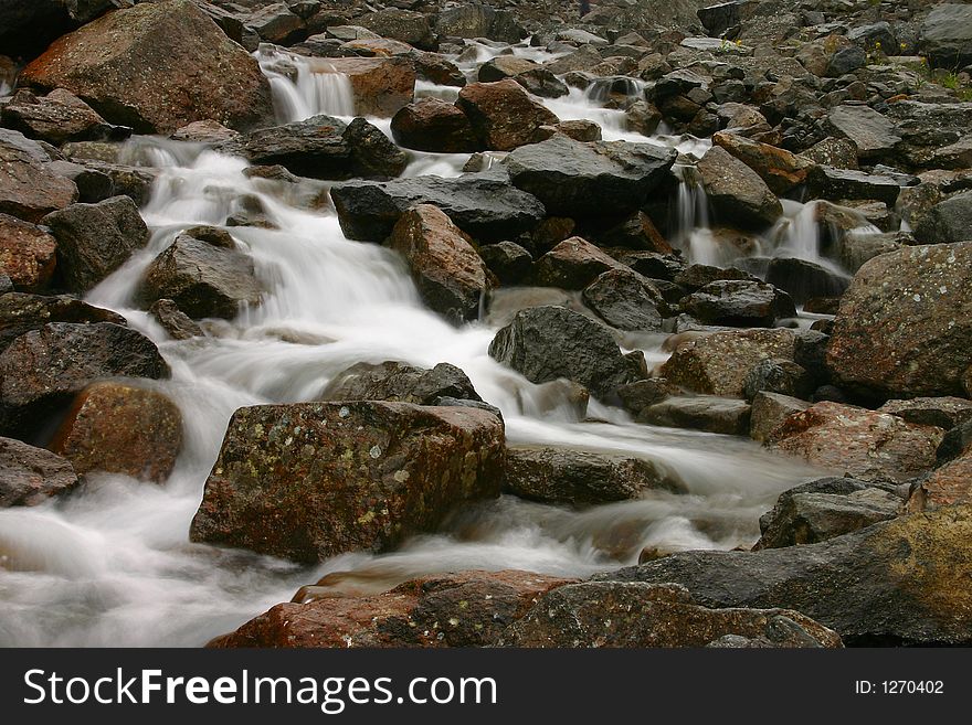 Rough mountain stream in northern mountains of the Europe. Rough mountain stream in northern mountains of the Europe