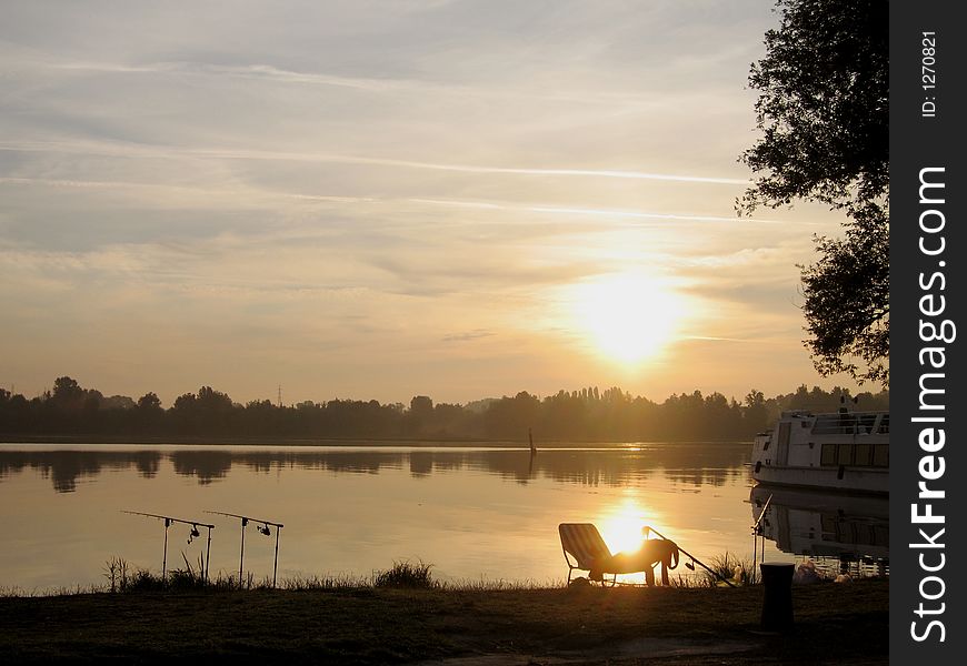 I took this picture in Mantova, Italy during our holiday in tuscany. Woke up very early and saw the sun rise beautiful above the lake. I took this picture in Mantova, Italy during our holiday in tuscany. Woke up very early and saw the sun rise beautiful above the lake.