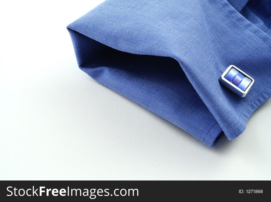 Cuff of a shirt on a white background. Cuff of a shirt on a white background.