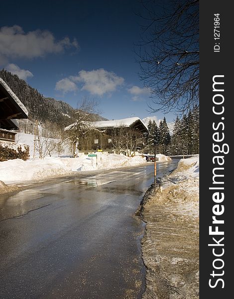 Wet winter road in alpine. Wet winter road in alpine