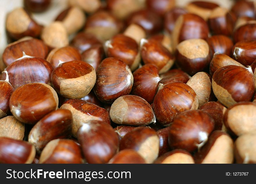 Closeup of ripe brown chestnuts.