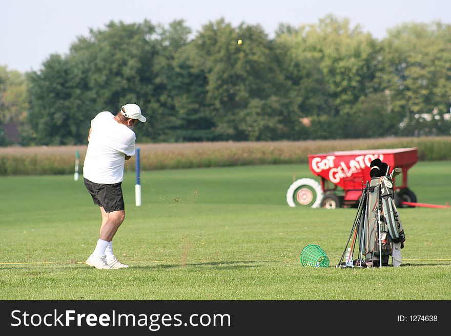 A Man Practicing His Swing