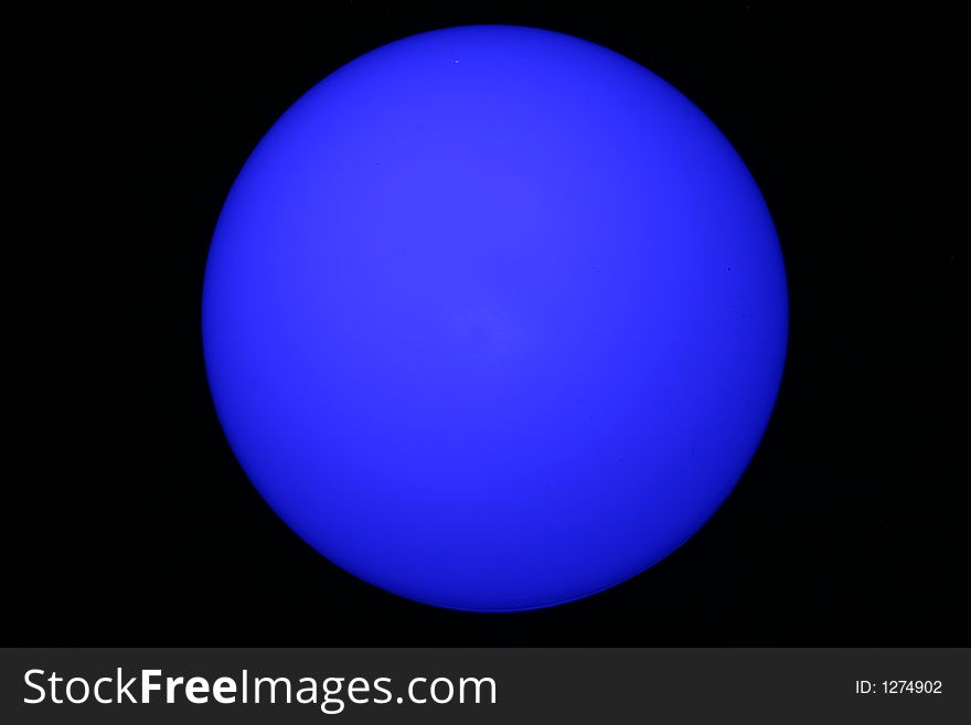 An abstract glowing blue moon