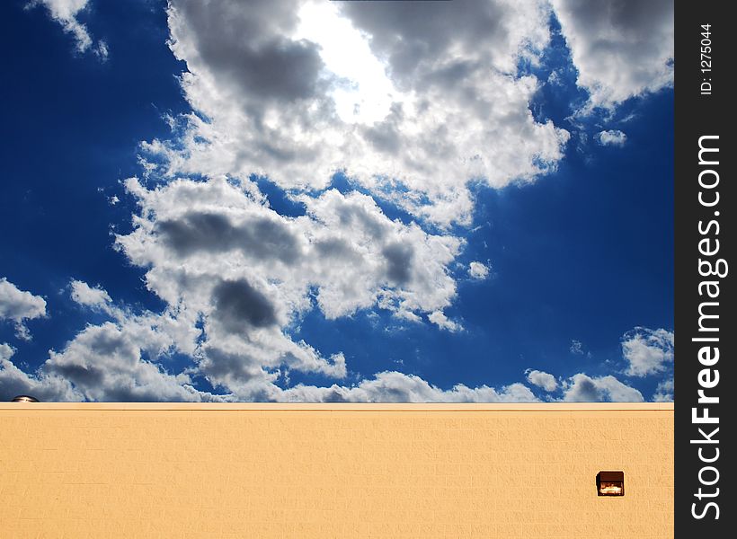 Afternoon Blue sky behind a wall. Afternoon Blue sky behind a wall