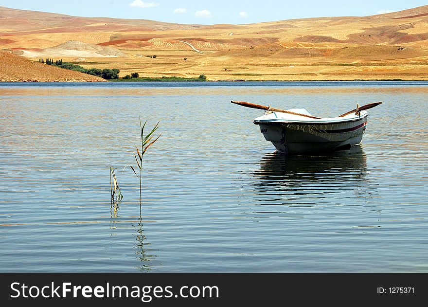 Boat on the water in Turkish lake