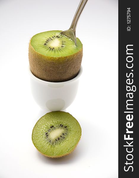 New Zealand Kiwi fruit in an eggcup. New Zealand Kiwi fruit in an eggcup