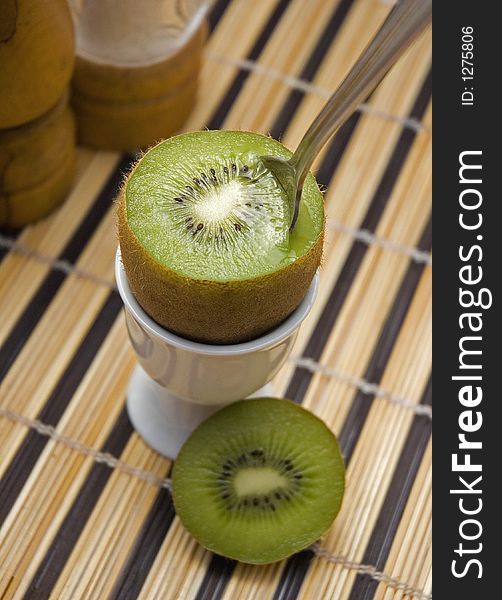 New Zealand Kiwi fruit in an eggcup. New Zealand Kiwi fruit in an eggcup