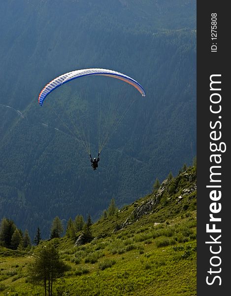 Someone parasenfing in Chamonix in the Alps. Someone parasenfing in Chamonix in the Alps