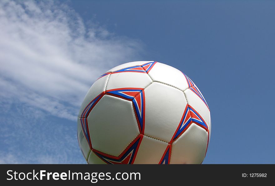 Soccer ball against blue sky. Soccer ball against blue sky