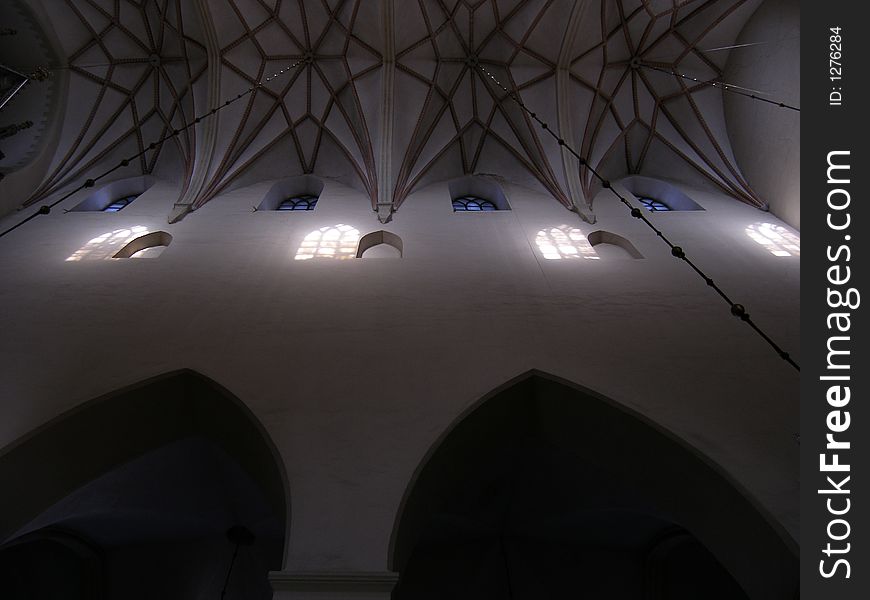 Old church ceiling with sunbeams