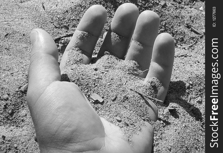 Sand In Hand