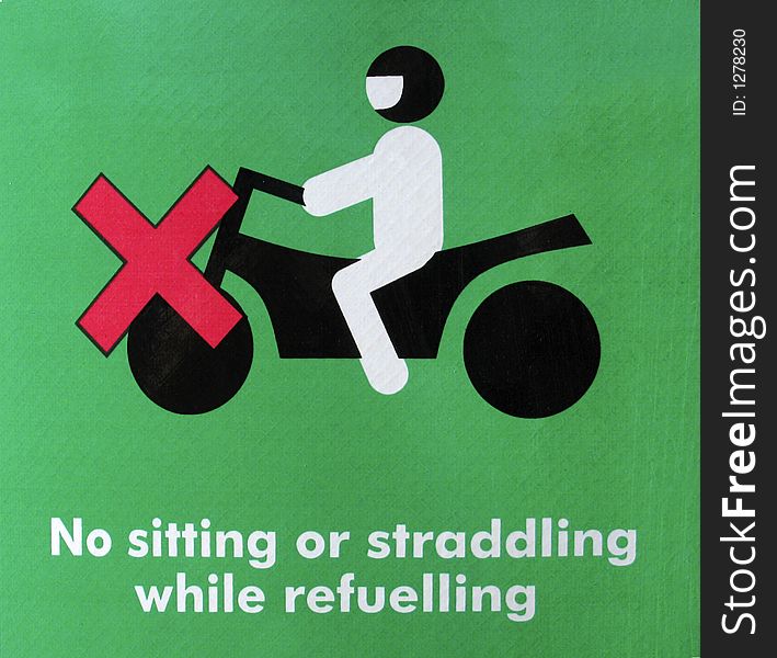 Graphic sign warning to get off your motorcycle to fuel. Graphic sign warning to get off your motorcycle to fuel