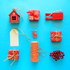 Red Christmas Gift Boxes And Decorations On Blue Background. Flat Lay. Top View Royalty Free Stock Photography