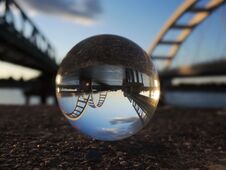 Two Bridges On The River Danube Reflection In Crystal Ball Stock Photo