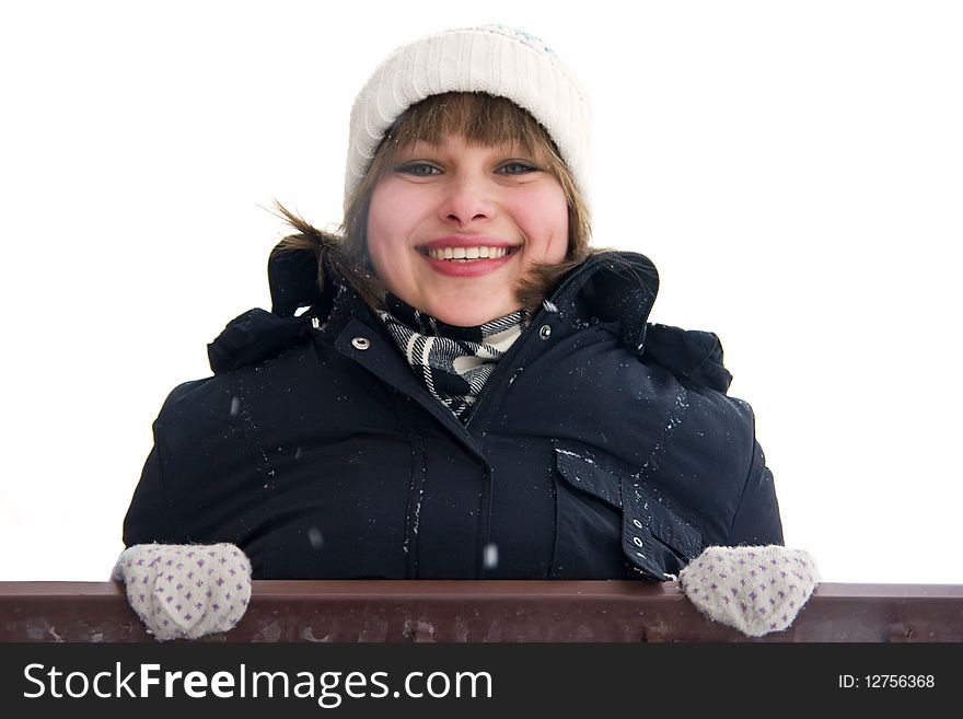 Smiling girl on the balcony above isolated on white background