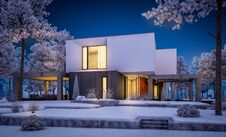3d Rendering Of Modern House With Garden In Winter Night Royalty Free Stock Photos