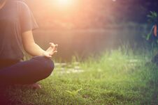 Close Up Of Young Woman Doing Yoga Stock Photos