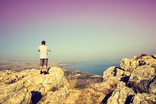 Man Standing On Arbel Cliff Stock Images