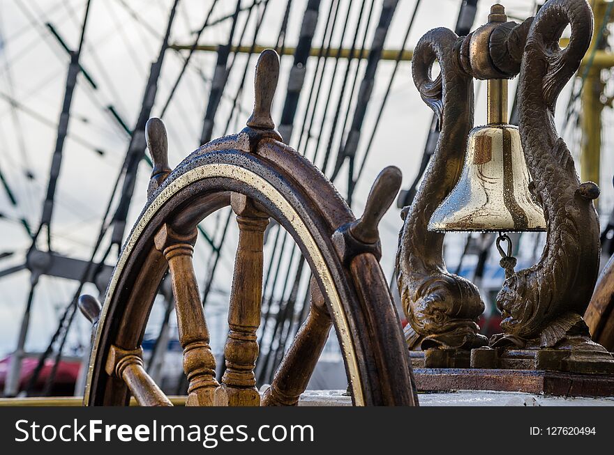 Ship Bell and wheel the old sailboat