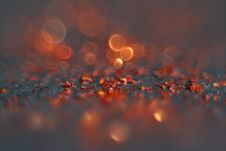 Abstract Red Bokeh On A Black Background. Defocused. Stock Image