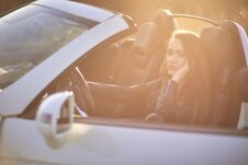 Beautiful Girl With Long Hair In A Leather Jacket And Leather Pants In Sunglasses Sits In An Expensive Car At Royalty Free Stock Image Beautiful Girl With Long Hair In A Leather Jacket And Leather Pants In Sunglasses Sits In An Expensive Car At Royalty Free Stock Image