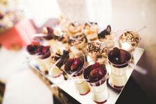 Delicious Sweets On Wedding Candy Buffet With Desserts, Cupcakes Stock Photo