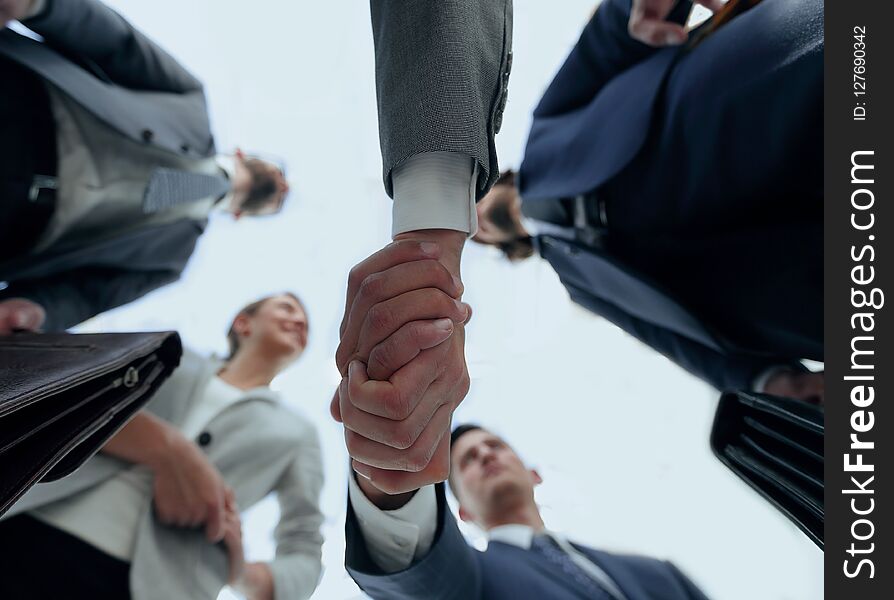 Bottom view.business handshake.the concept of partnership