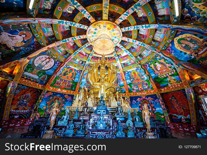 Buddha statue set in beautiful dome, Thailand.