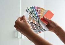 Female Interior Designer With Color Palette Samples Indoors Stock Image Female Interior Designer With Color Palette Samples Indoors Stock Image