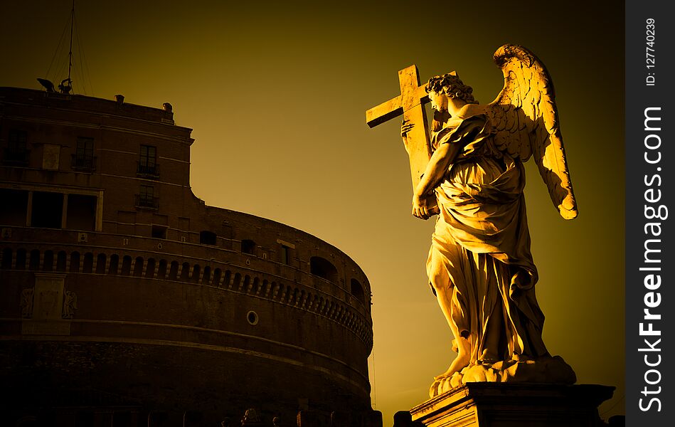 Rome, statue of an angel on the bridge in front of Castel Sant`Angelo. Conceptual useful for spirituality, christianity and faith. Rome, statue of an angel on the bridge in front of Castel Sant`Angelo. Conceptual useful for spirituality, christianity and faith.