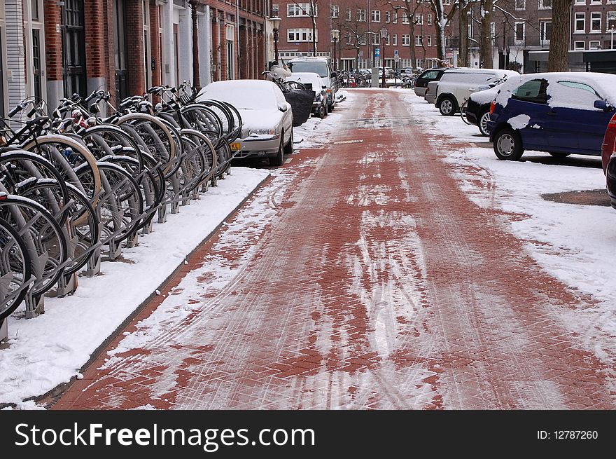 Snowy street in Amsterdam during winter