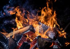 Burning Wooden Logs In Fire, Campfire On Black Royalty Free Stock Photography