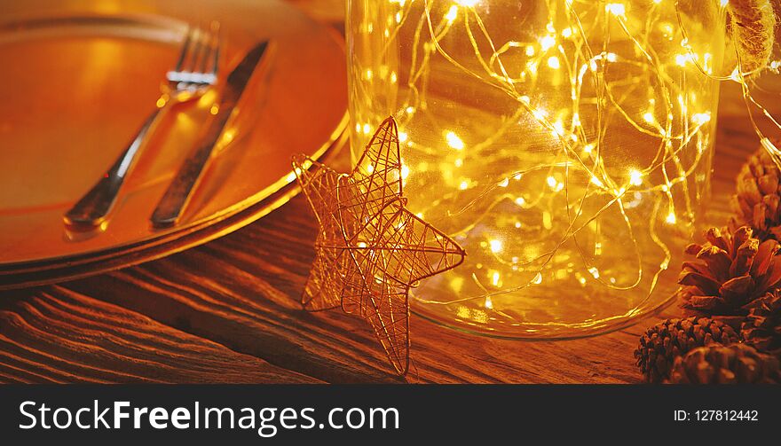 Plate and cutlery with Christmas decoration