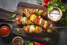 Grilled Shish Kebab With Vegetables On Black. Royalty Free Stock Images