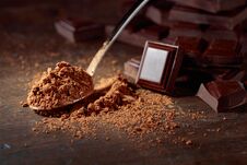 Broken Chocolate Pieces And Cocoa Powder . Stock Images Broken Chocolate Pieces And Cocoa Powder . Stock Images