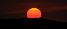 Panoramic Sunrise Over Mountain Peak With Huge Orange Sun Royalty Free Stock Photos Panoramic Sunrise Over Mountain Peak With Huge Orange Sun Royalty Free Stock Photos