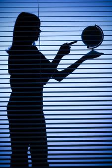 Silhouette Of Woman With Globe (blind) Stock Images