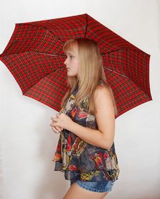 Young Woman With Umbrella Stock Photo