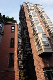Tall Building With Fire Escape And Bay Windows Full Color Stock Photo Tall Building With Fire Escape And Bay Windows Full Color Stock Photo