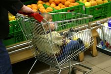 Child In A Carriage Stock Images