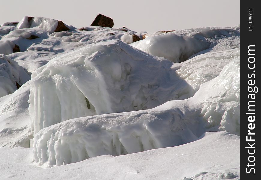 Rocks covered by ice on island near Helsinki