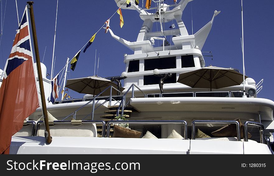 Entrance to rear deck of a large motor yacht under foreign flag