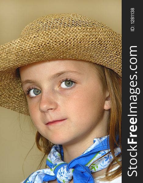 Little girl wearing straw hat with big eyes. Little girl wearing straw hat with big eyes