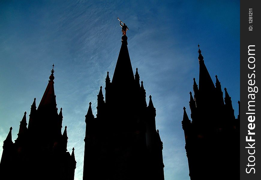 Mormon temple silhouette with blue sky
