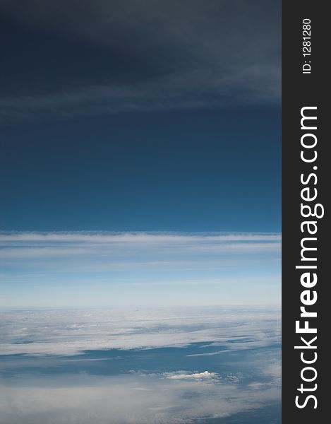 Weather above the continent seen from an airplane at 33.000 feet. Weather above the continent seen from an airplane at 33.000 feet.